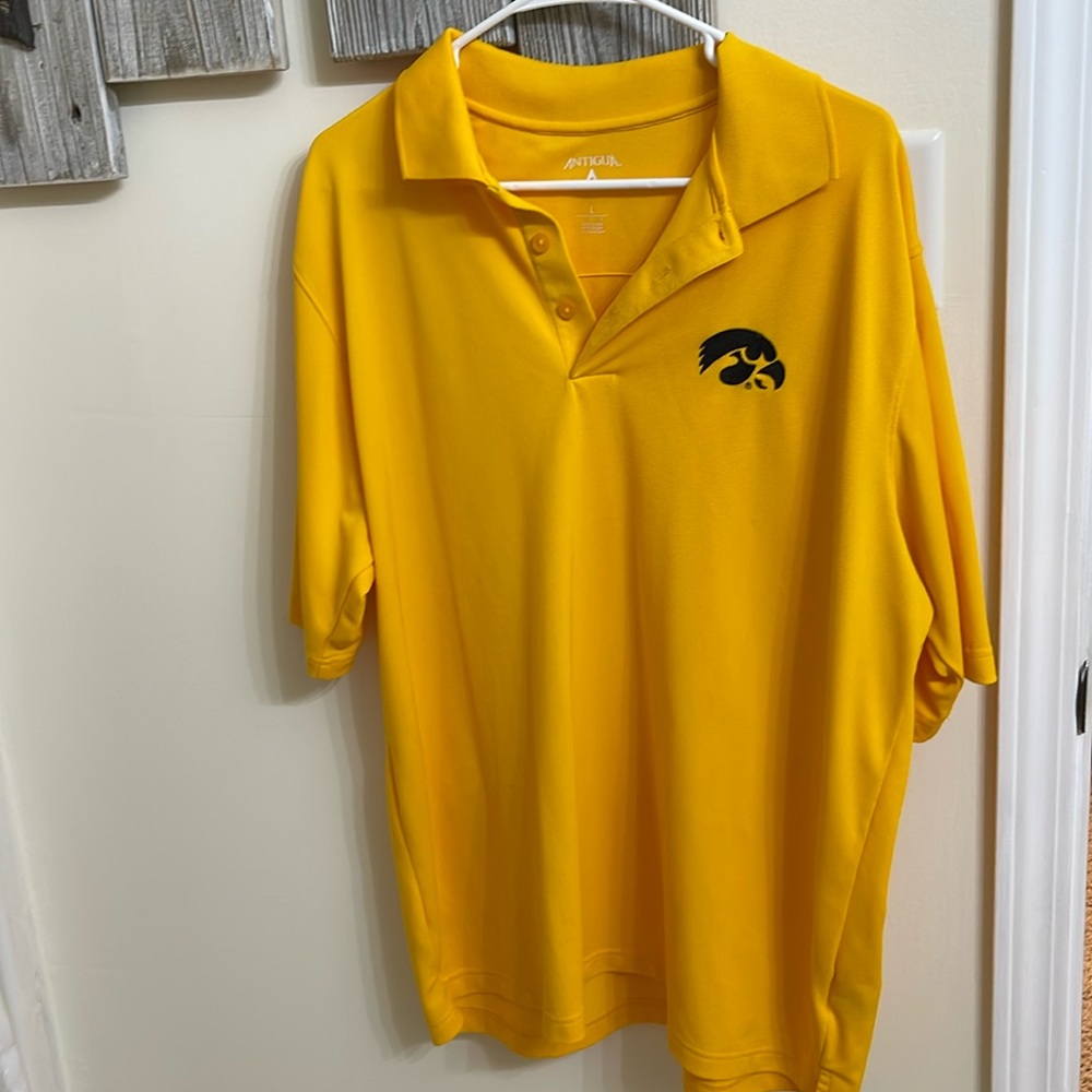 Iowa Hawkeyes Men’s Golf Shirt.  Embroidered black Hawkeye logo.  Antigua.